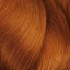 Wellige kupferfarbene Haarsträhnen mit L’Oréal Professionnel Majirel Haarfarbe