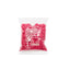 Bag of rose-colored depilatory wax beads for professional hot film waxing by Ronney